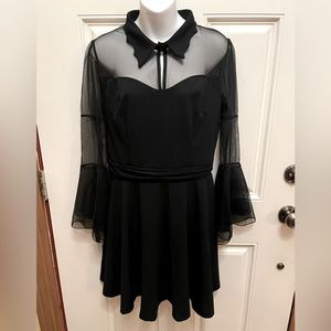 Black XL stunning dress with a scalloped collar and sheer top.